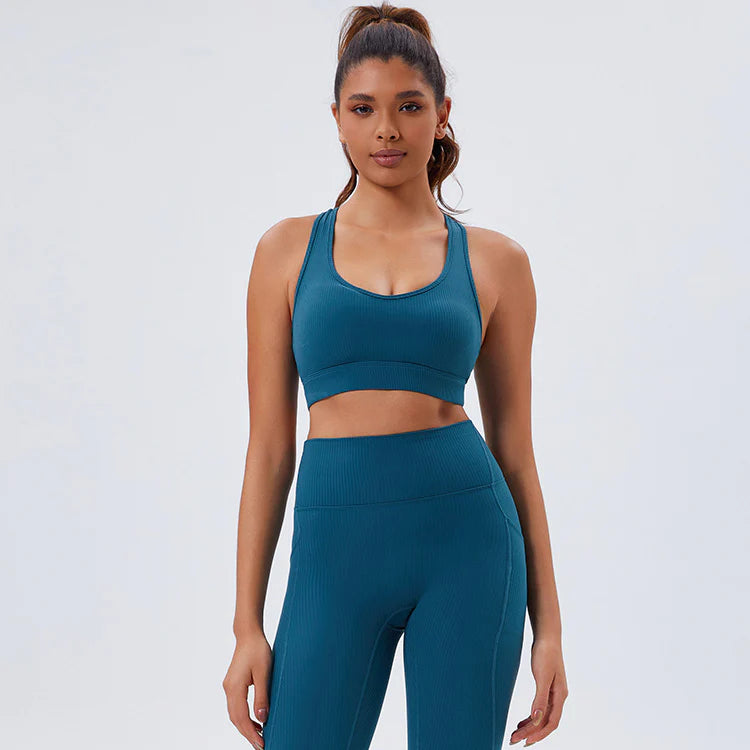 Teal-ribbed-sports-bra-with-scoop-neckline-and-wide-straps-for-workouts-and-yoga